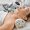 Photorejuvenation, rosacea treatment, removing brown spots and vascular mesh. Cosmetologist using IPL apparatus treats skin of female patient's face